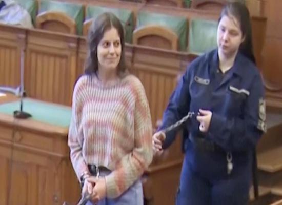 Outrage after woman appears in court shackled and bound in chains