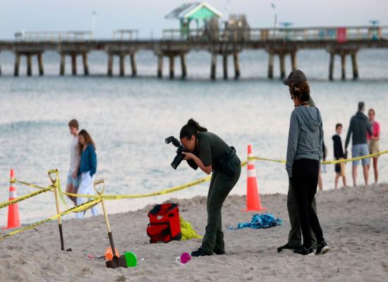 Young girl dies after being buried by sand while digging hole on beach