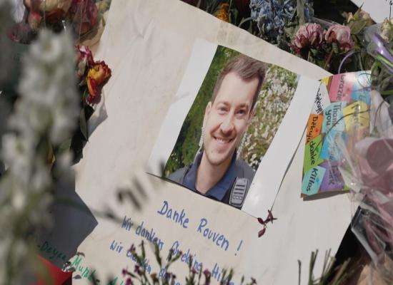 German city mourns police officer killed in crime that stokes EU election divisions