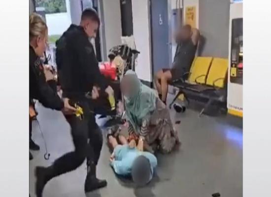 Policeman kicks and stamps on man's head at airport - as officer 'removed from operational duties'