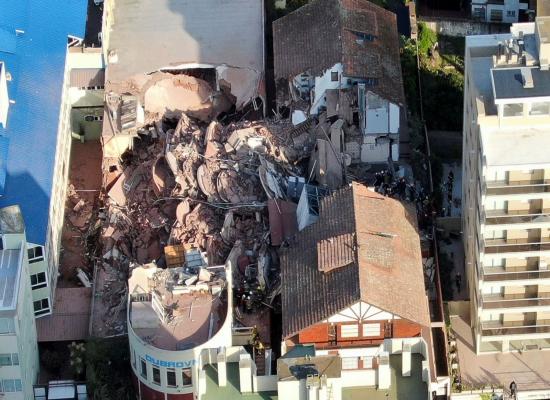 Hotel building collapses - people feared trapped