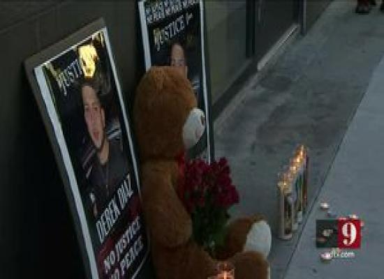 A vigil was held Sunday for a man shot and killed by Orlando police