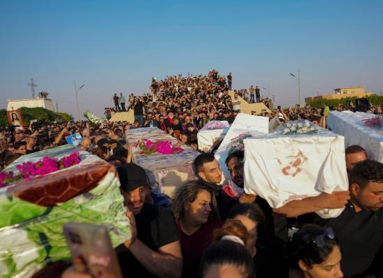 Second day of funerals as Iraqi families bid wedding fire victims farewell