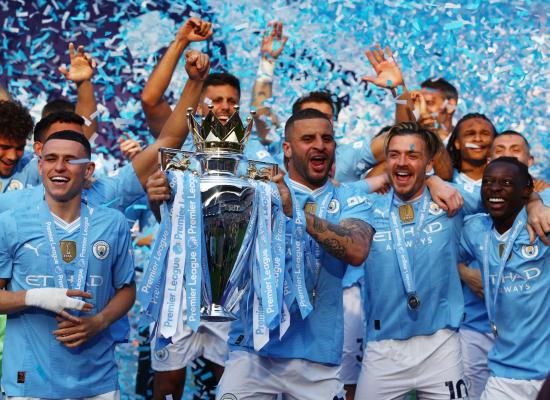 Man City clinch historic fourth Premier League title despite Arsenal win