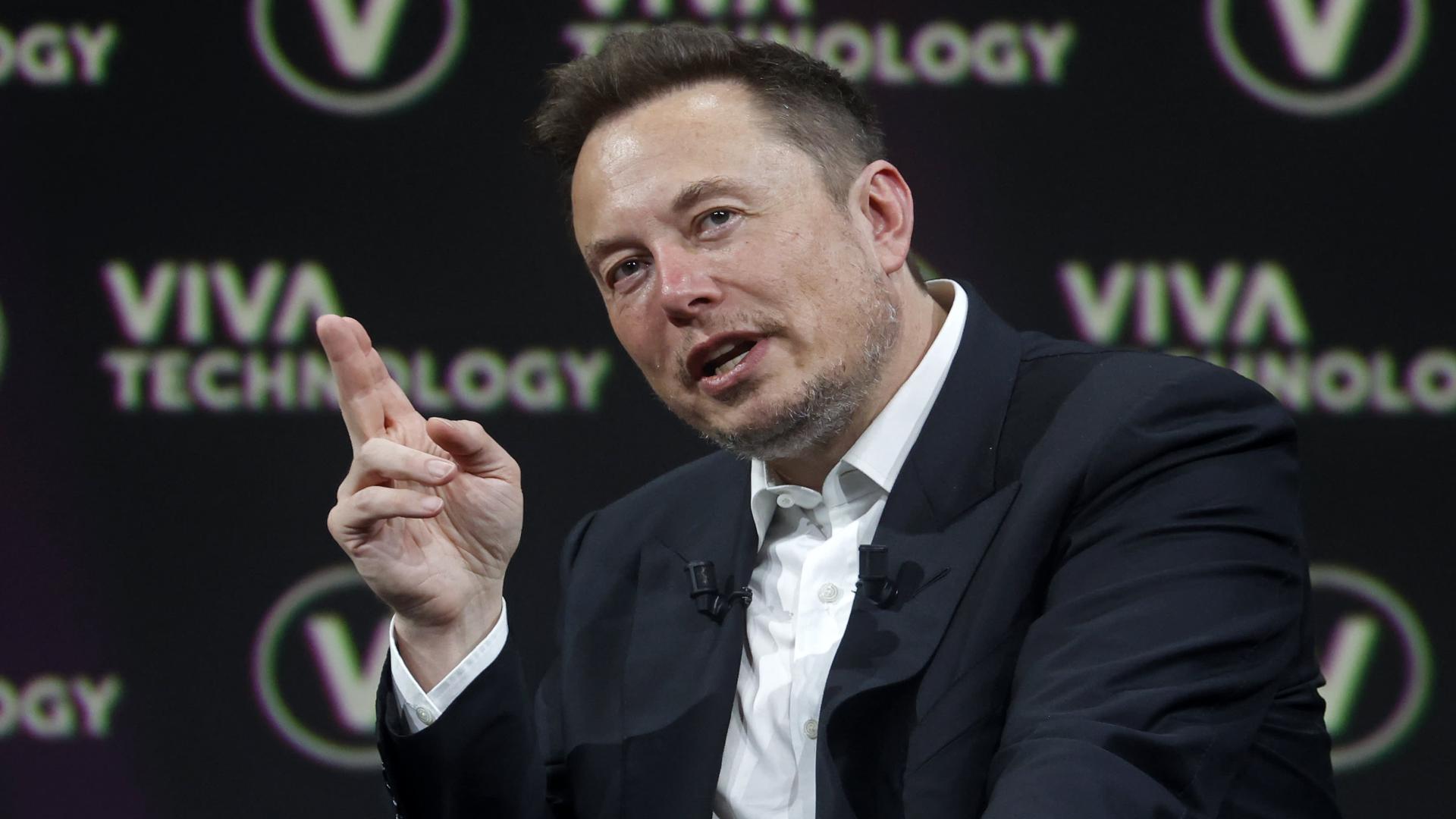 Elon Musk says Tesla's market cap is directly tied to whether it solves autonomous driving